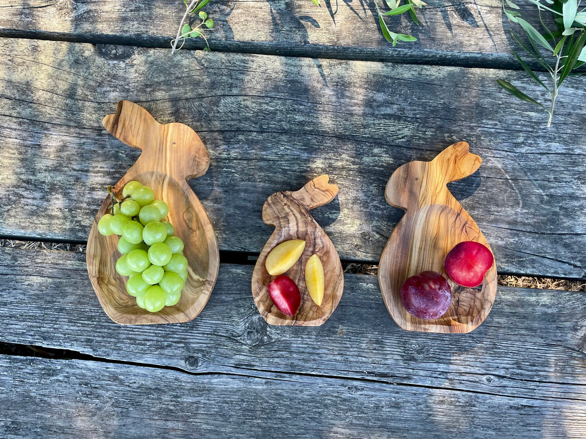 Handmade olive wood bunny-shaped snack plates with fruit
