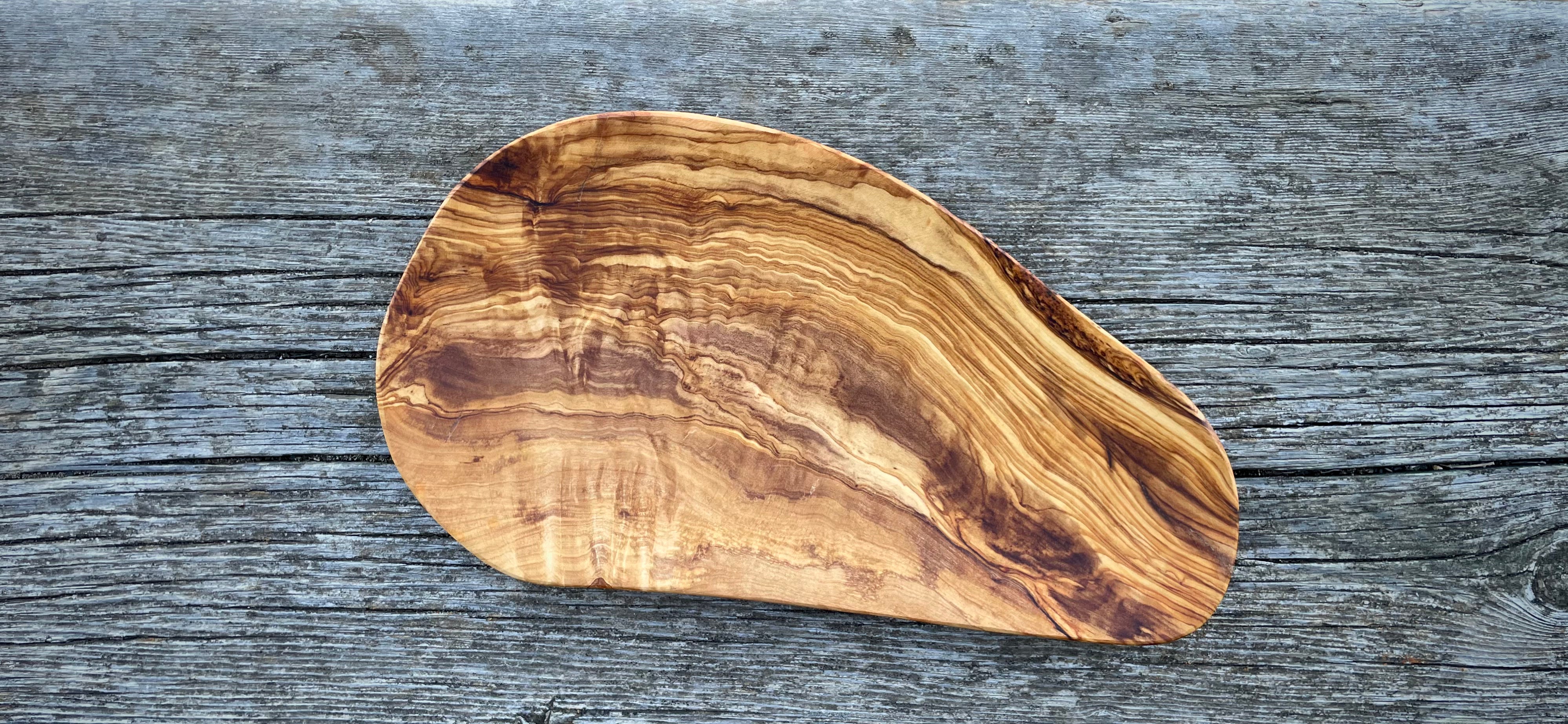 Handmade olive wood serving and charcuterie platter with grain