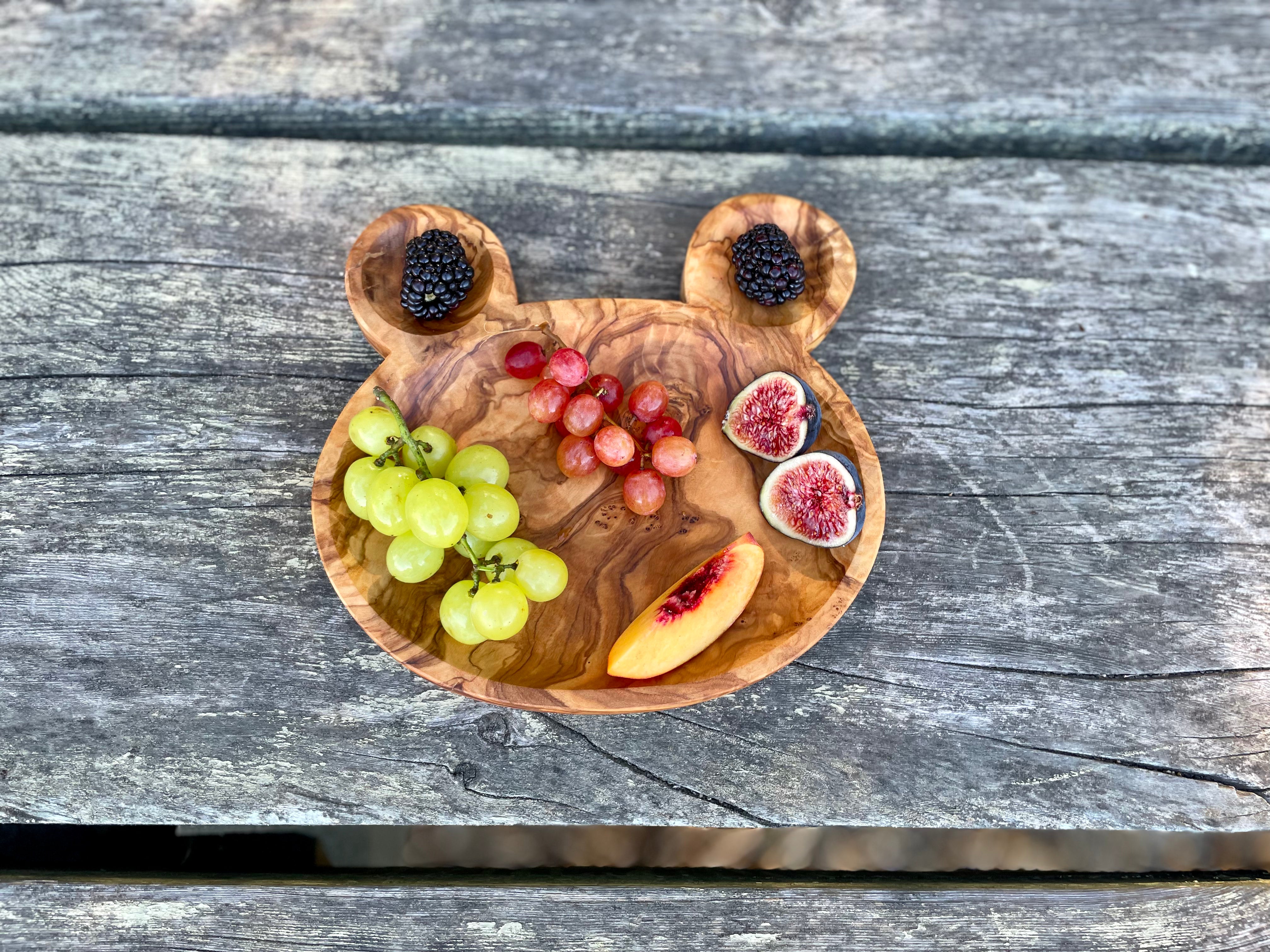 Handmade olive wood bear-shaped snack plate with fruit